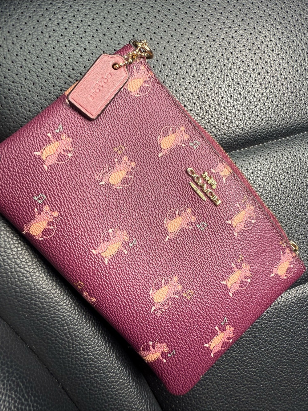 Coach Plum Pink Printed Pebbled Leather Wristlet Pouch